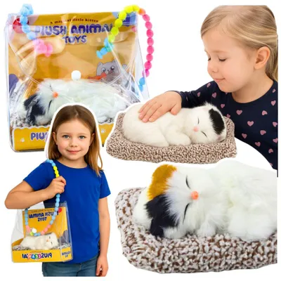 Image de Chat blanc endormi sur un coussin, figurine avec sac à fourrure et sons
