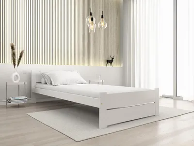 A minimalist bedroom setting with a white bed.