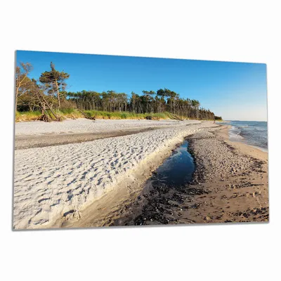 Produktbild von Wallario Herdabdeckplatte aus Glas, Größe 90 x 52 cm 1-teilig, Motiv Einsamer Strand am Meer - Blauer Himmel