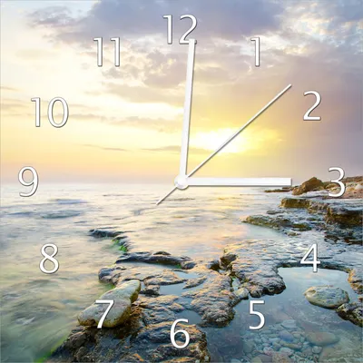 Produktbild von Wallario Design Wanduhr Sonnenuntergang über dem Meer aus Echtglas, Größe 30 x 30 cm
