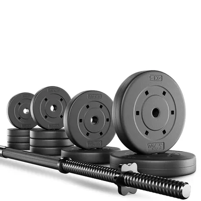 A set of weight plates and a barbell are arranged on a white background.
