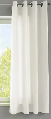 A close-up view of white curtains hanging in front of a window.