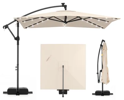 Zdjęcie produktu dla Parasol COSTWAY 250 cm z podstawą, oświetleniem LED i korbą, parasol kwadratowy typu „traffic light”, parasol ogrodowy obracany o 360°, parasol targowy/tarasowy w kolorze beżowym