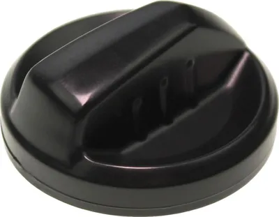 A black plastic cap with a handle on a white background.