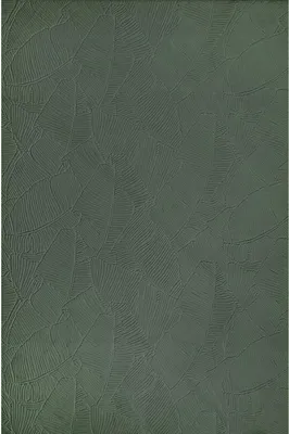 A close-up textured view of a green rug with a leaf-like pattern.