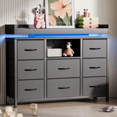 Obrázok produktu pre Komoda s látkovým čelom, kovovým rámom, 8 zásuvkami, LED osvetlením a USB portom, čierna farba