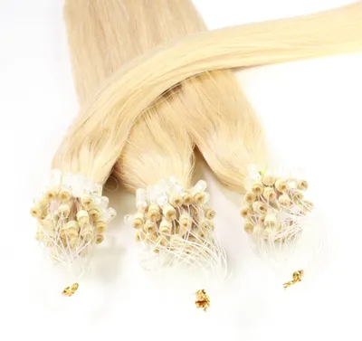 Zdjęcie produktu dla Przedłużanie włosów metodą mikroringów, włosy naturalne #9/0 jasny blond 1 g