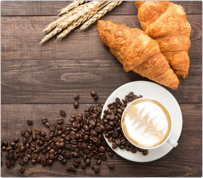Produktbild von Spritzschutz Herdabdeckplatte Schneidebrett aus Glas Croissant und Kaffee 1-Teilig (60x52cm)
