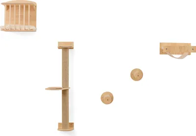 Several wooden cat climbing and scratching accessories mounted on a white wall.