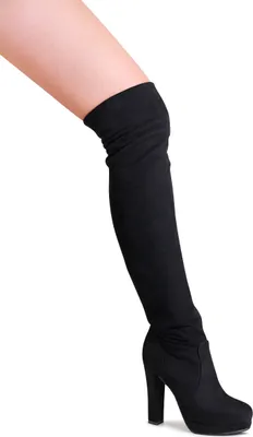A person's leg wearing a black over-the-knee boot.