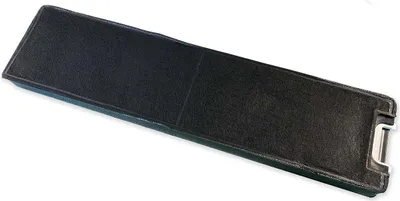 A black, rectangular filter with a metallic clasp on the end, lying diagonally on a white background.