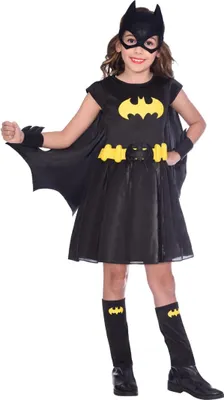 A young girl dressed as Batgirl, posing against a white background.
