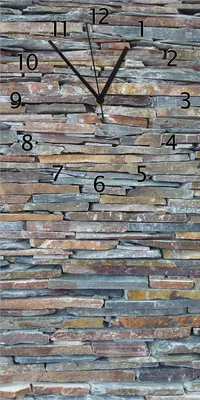 Produktbild von Wallario Design Wanduhr bedruckt, Größe 30 x 60 cm, Motiv: Natursteinmauer in grau braun