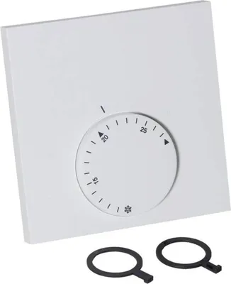 A white analog thermostat with a circular dial and temperature markings.