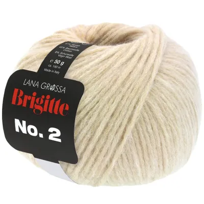 A ball of beige yarn with a black label.