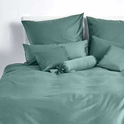 Produktbild von Traumschlaf Uni Mako-Satin Kissenbezüge Nackenrollenbezug 15x40 cm salbeigrün