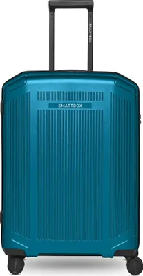 A studio shot of a blue metallic suitcase with its handle extended.