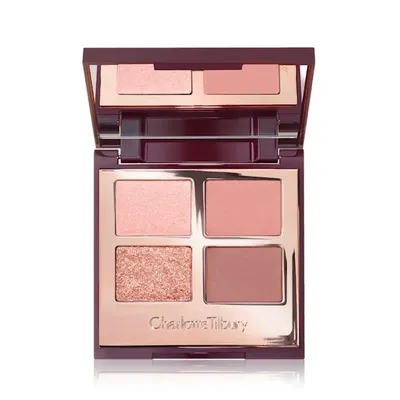 A top-down view of an open eyeshadow palette.