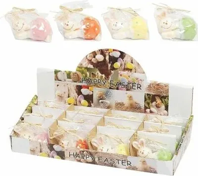 Produktbild von Kerze Osterhase, 7 x 4 cm 35 g Wachs, 1 aus 4 Varianten, in Folie mit Schleife