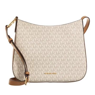 A Michael Kors crossbody bag is shown against a white background.