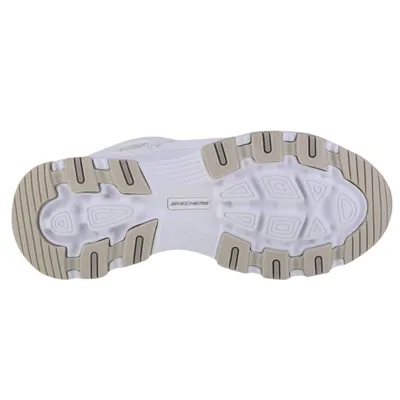 The sole of a white and tan Skechers sneaker is shown from an underneath view against a white background.