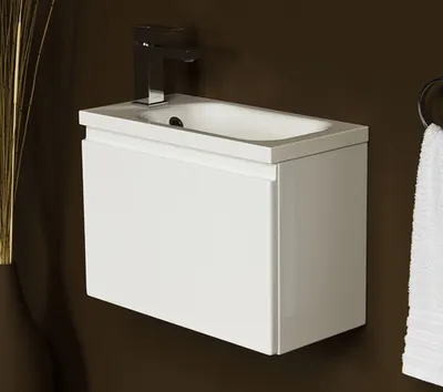 Produktbild von Quentis Gäste-WC Badmöbel FAROS 50, weiß glänzend, Waschbeckenunterschrank mit Klapptüre, montiert.