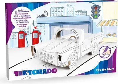 The image shows the packaging for a cardboard car kit that can be colored in. The packaging features a drawing of a city scene with a car, gas pumps, and buildings. The product name 'TEKTORADO' is prominently displayed.