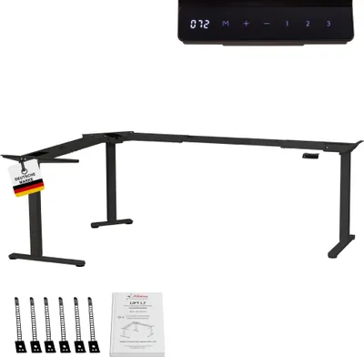 A black L-shaped standing desk frame with a control panel and accessories shown below.