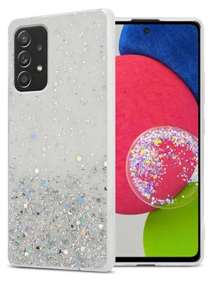 A close-up shot of a phone case with glitter inside, placed next to a phone.