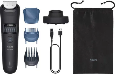 A collection of Philips beard trimmer accessories laid out on a white background.