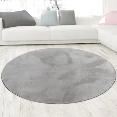 Immagine prodotto di Tappeto in pelliccia di coniglio grigio dall'aspetto elegante e morbido, con raffinati riflessi moderni Dimensioni - 120 cm rotondo