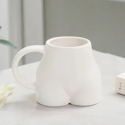 Productafbeelding van Keramische mok met handvat, design met lichaamskunstmotieven, wit