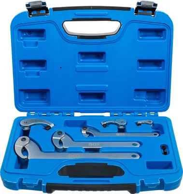 A set of hook wrenches in a blue plastic case.