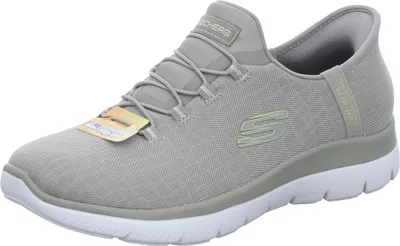 A single beige Skechers women's slip-on shoe is shown against a white background.