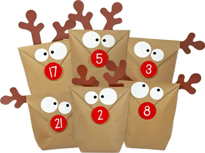 A group of DIY advent calendar bags decorated as reindeer, with numbers on red circles.