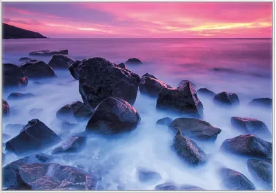 Produktbild von Wallario Wandbild Felsen im Meer bei Sonnenuntergang, Größe: 70,30 x 100,30 cm, Poster mit weißem Kunststoffrahmen