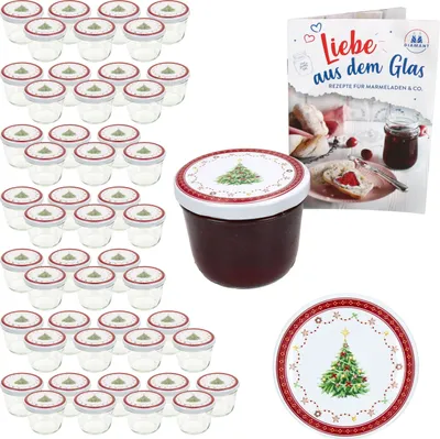 A set of glass jars with lids, a jar filled with jam, and a recipe book.