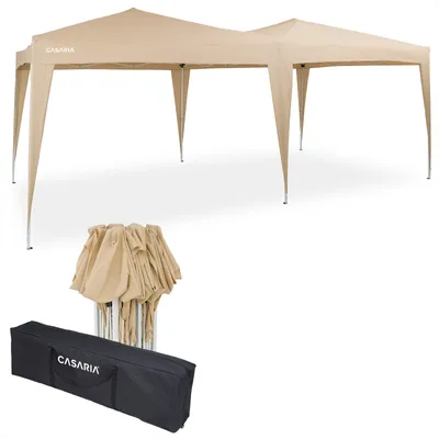 A beige pop-up gazebo and its folded components are displayed against a white background.