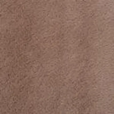 A close-up of a brown carpet texture.