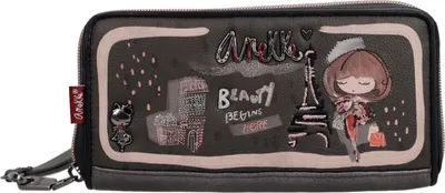 A close-up shot of a wallet with a Parisian-themed design.