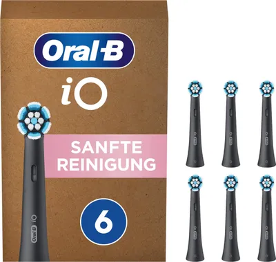 A product package for Oral-B iO toothbrush heads, with several brush heads displayed separately.