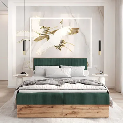 A bedroom scene with a bed as the main focus.