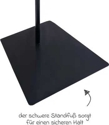 Close-up of a black metal stand base with a black pole extending upwards.