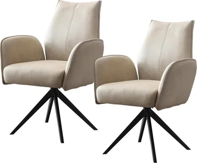 Two beige swivel chairs with black metal bases are shown against a white background.