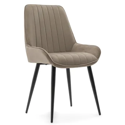 A single beige upholstered dining chair with black legs is displayed against a white background.