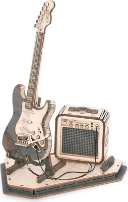 A wooden model of an electric guitar and amplifier set on a display base.