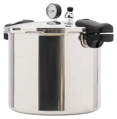 A stainless steel pressure cooker with black handles and a pressure gauge on top.