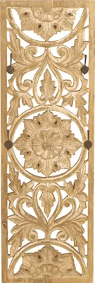A carved wooden wall panel with decorative floral motifs and four hooks.