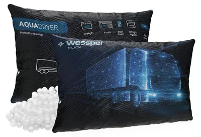 Two black humidity absorber bags with a truck graphic and product information.