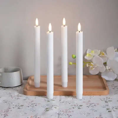 Immagine prodotto di 4 candele a LED, luce calda, 25 cm, senza fiamma, alimentate a batteria, ideali per decorazioni natalizie, matrimoni, feste e altri eventi, colore bianco